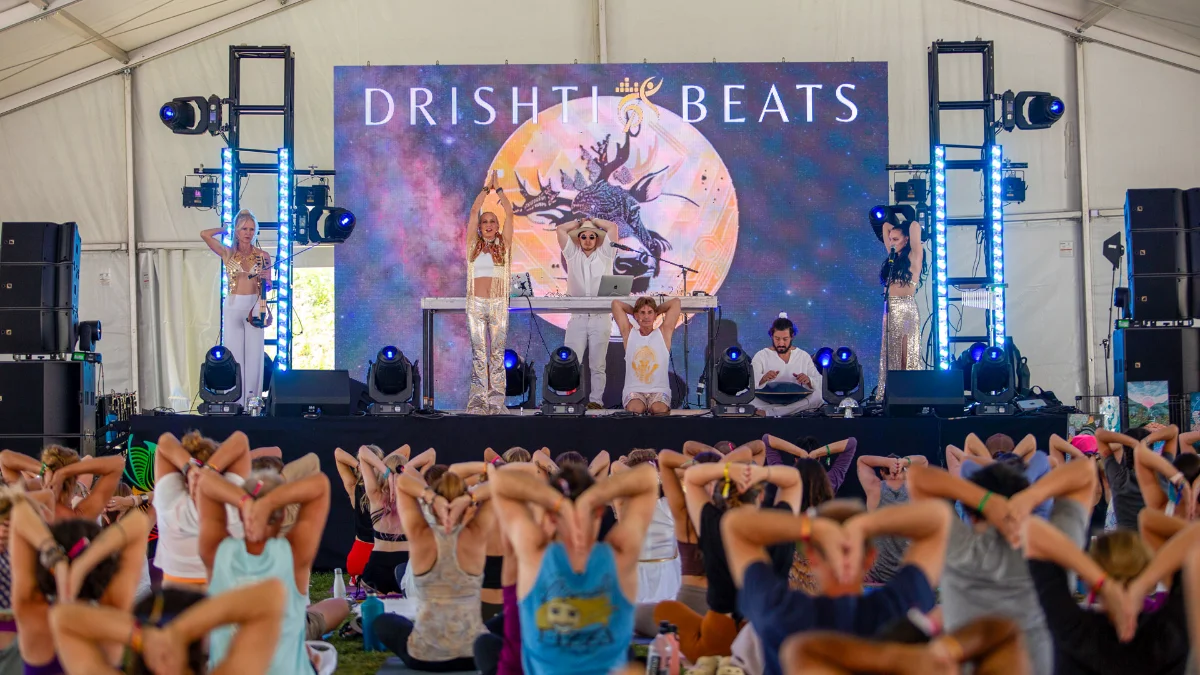 Online yoga class with music — Lori Lowell leading a vinyasa flow filmed in Bali with Drishti Beats.